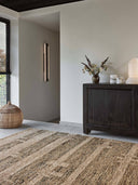 Sumak Spot hemp rug Tell Me More in a room with a nice black cabbage