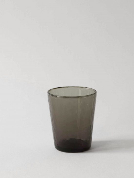 Galette smoked drinking glass from Tell Me More. Made of recycled glass.